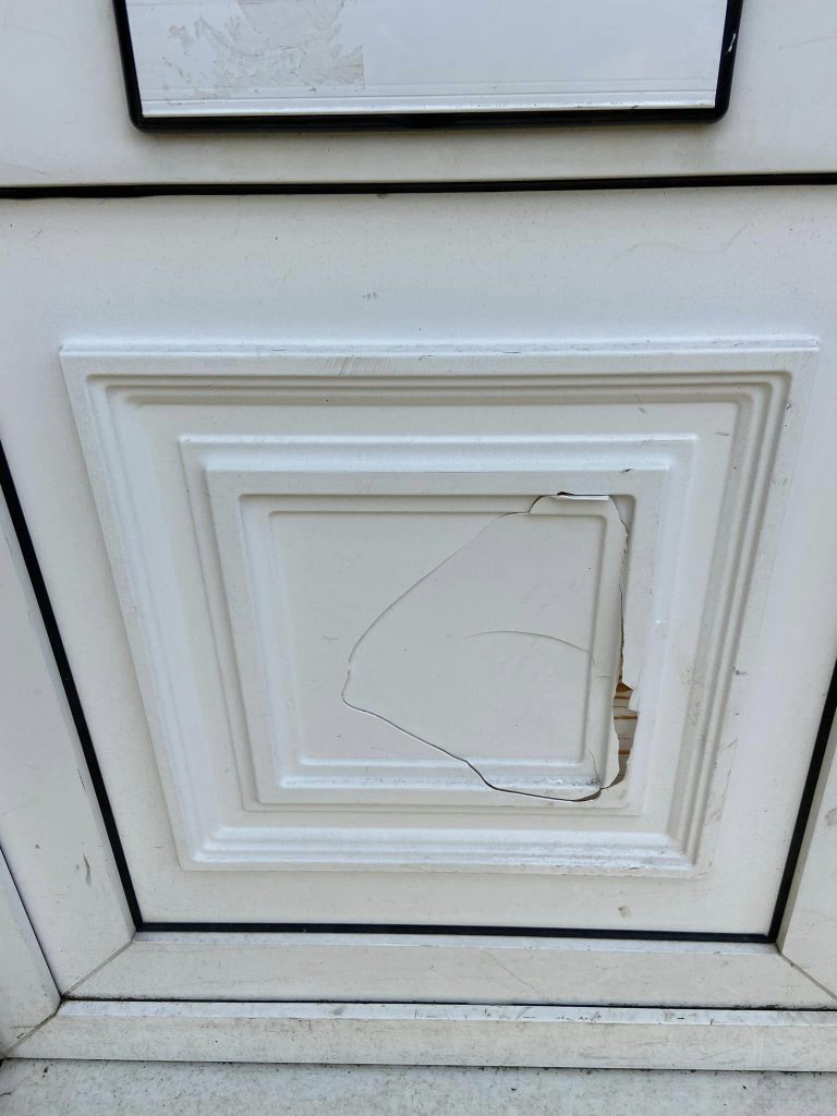 Old, broken UPVC door panel